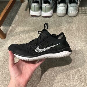 Nike Black and White Free running shoes